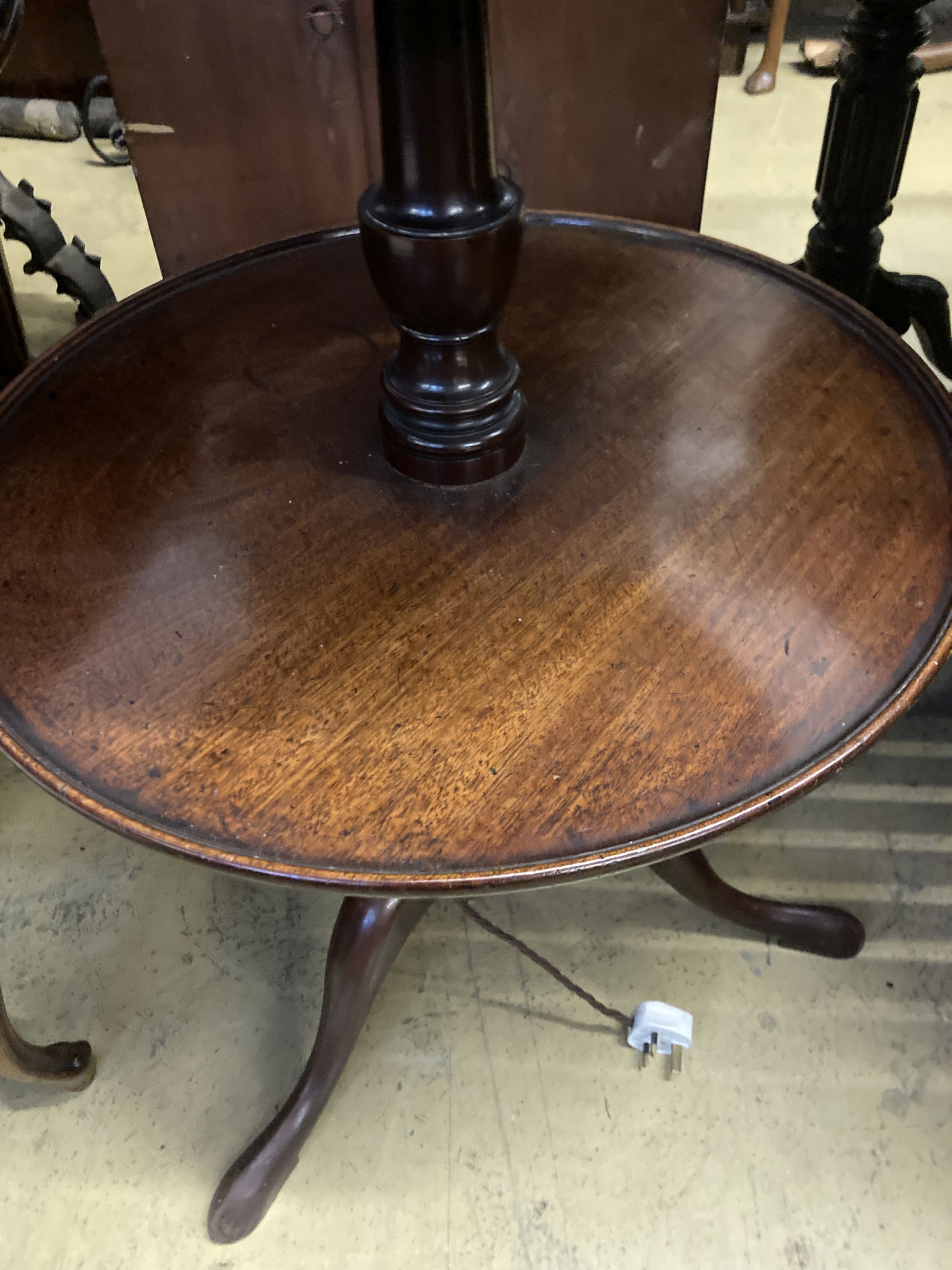 A George III mahogany three tier dumb waiter, converted to a lamp, height 115cm